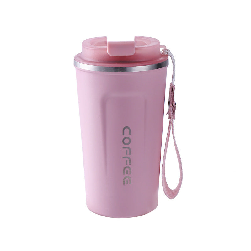 Pink coffee tumbler with a strap on a white background