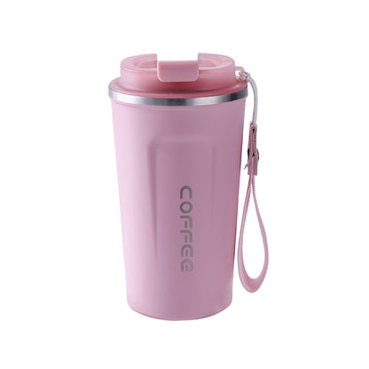 Pink coffee tumbler with a strap on a white background