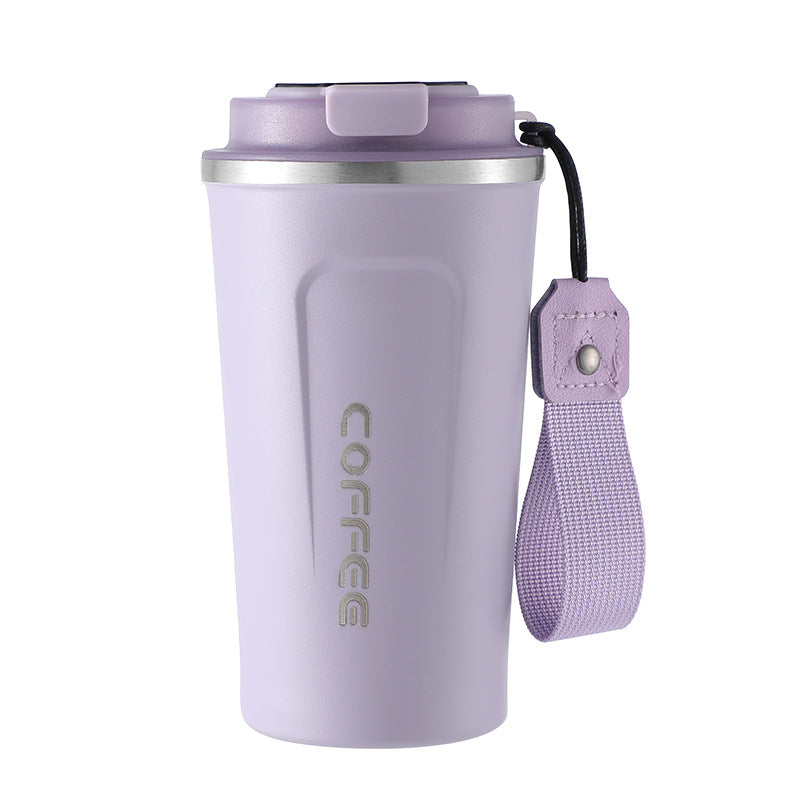 Purple coffee tumbler with a strap on a white background