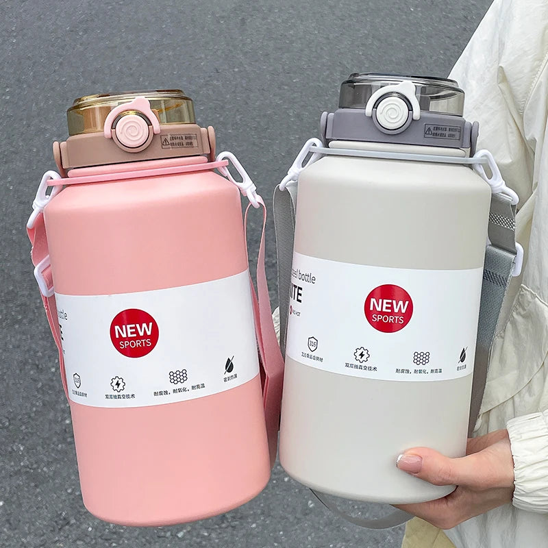 Two large water bottles, one pink and one gray, with 'NEW SPORTS' labels on a gray background.