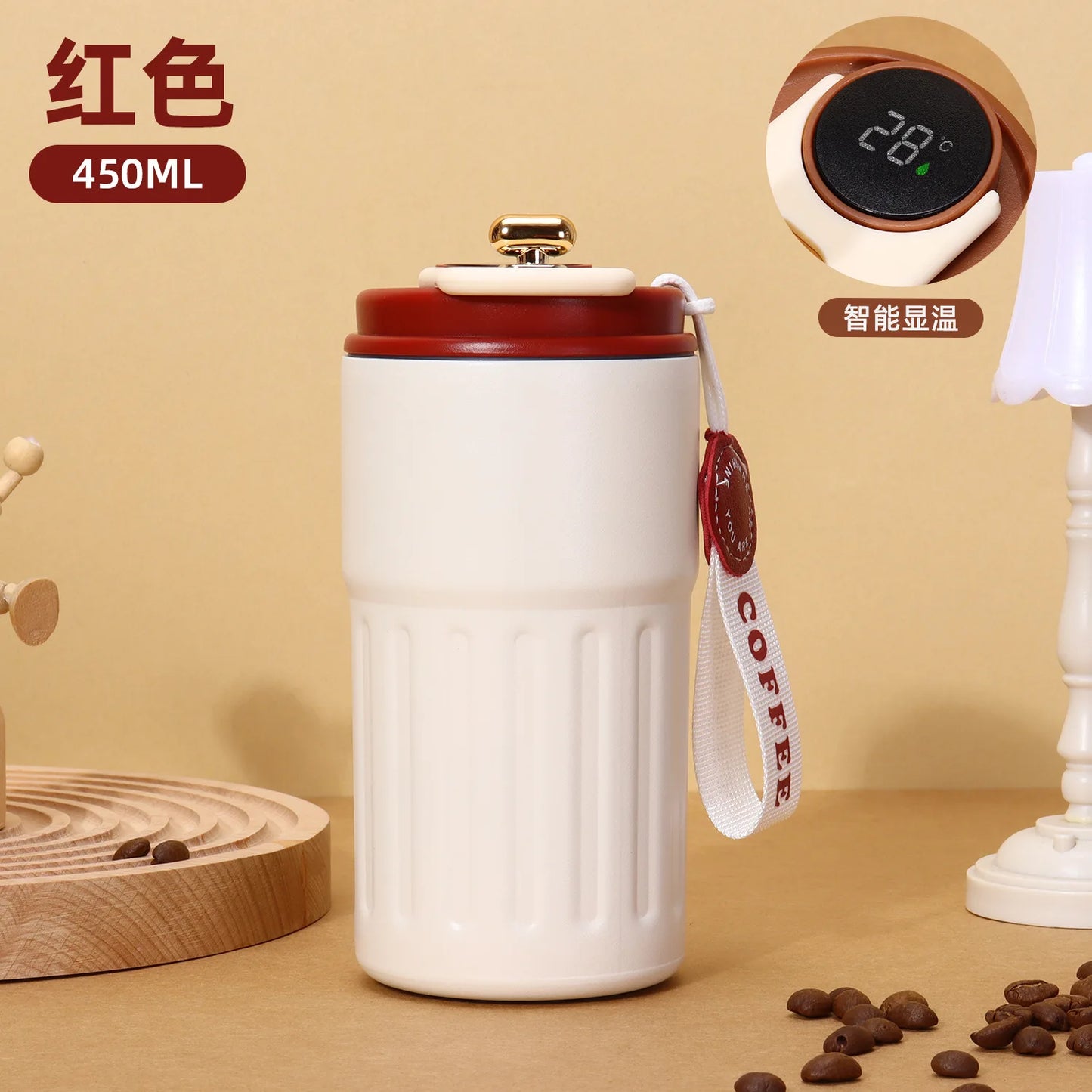 White and red thermos with temperature display on a beige background