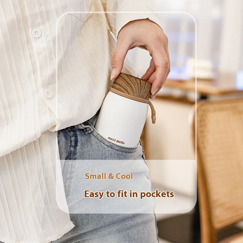 Person holding a small brown bag with text 'Small & Cool, Easy to fit in pockets' in an indoor setting.