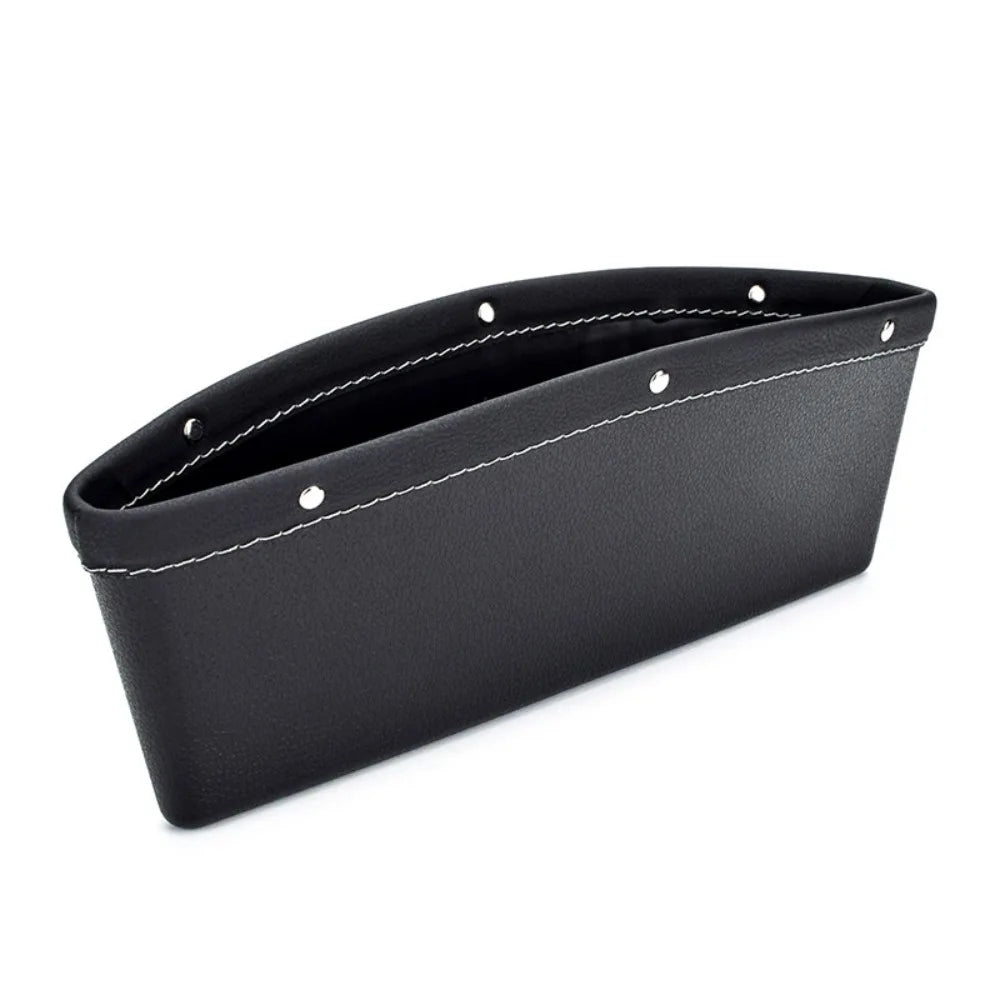 Black leather car organizer with white stitching on a white background