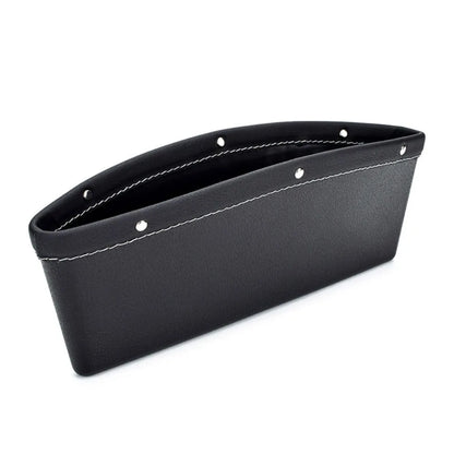 Black leather car organizer with white stitching on a white background