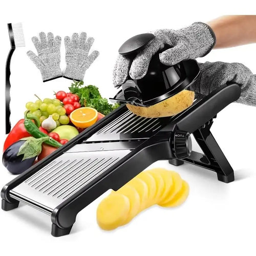 Black mandoline slicer with sliced potatoes, surrounded by vegetables and gloves on a white background