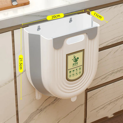 Wall-mounted trash bin with dimensions labeled on a tiled wall.
