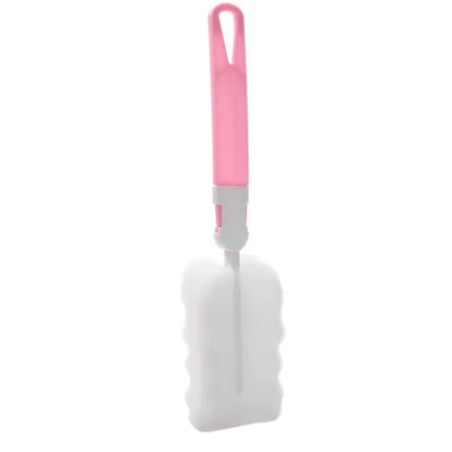 Cleaning brush with pink handle on a white background