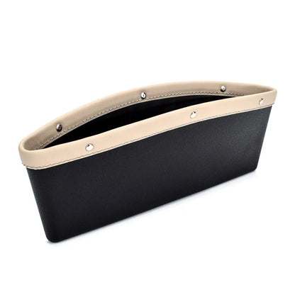 Black car organizer with beige top section on a white background