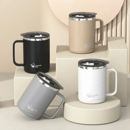 Four insulated mugs in black, beige, gray, and white on a neutral background