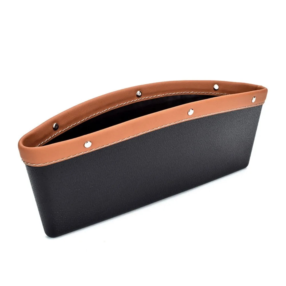 Black and brown car organizer with rivets on a white background